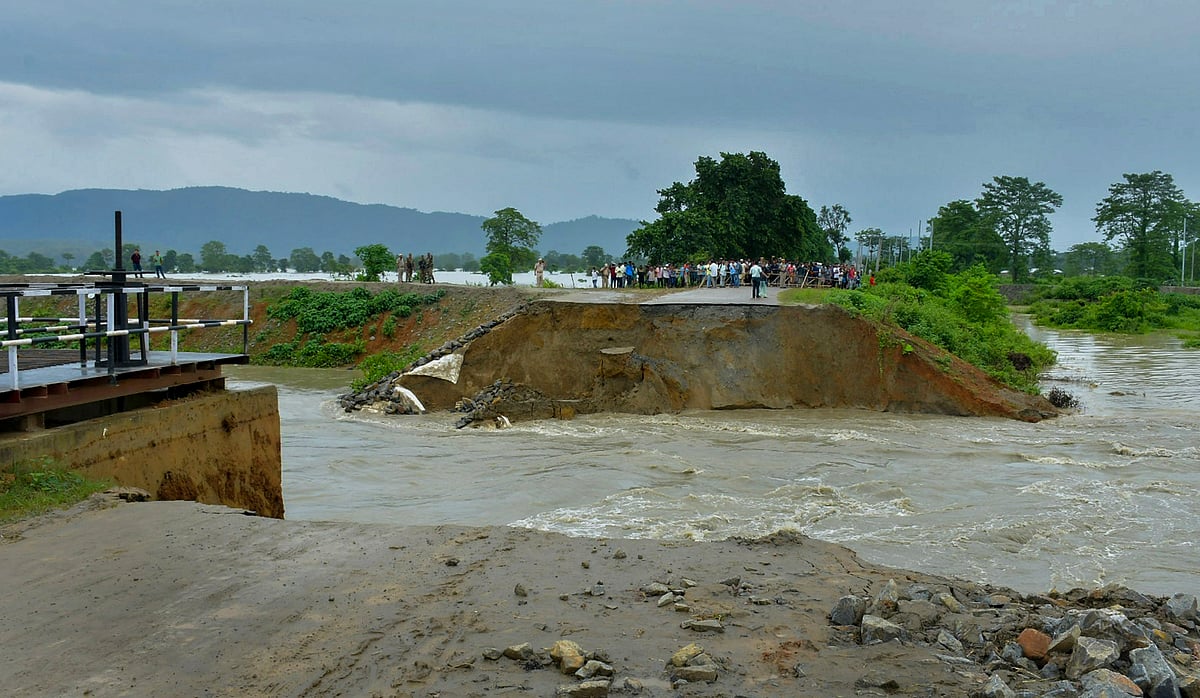 | Photo: PTI  : Assam Floods: Body of boy who fell into drain recovered